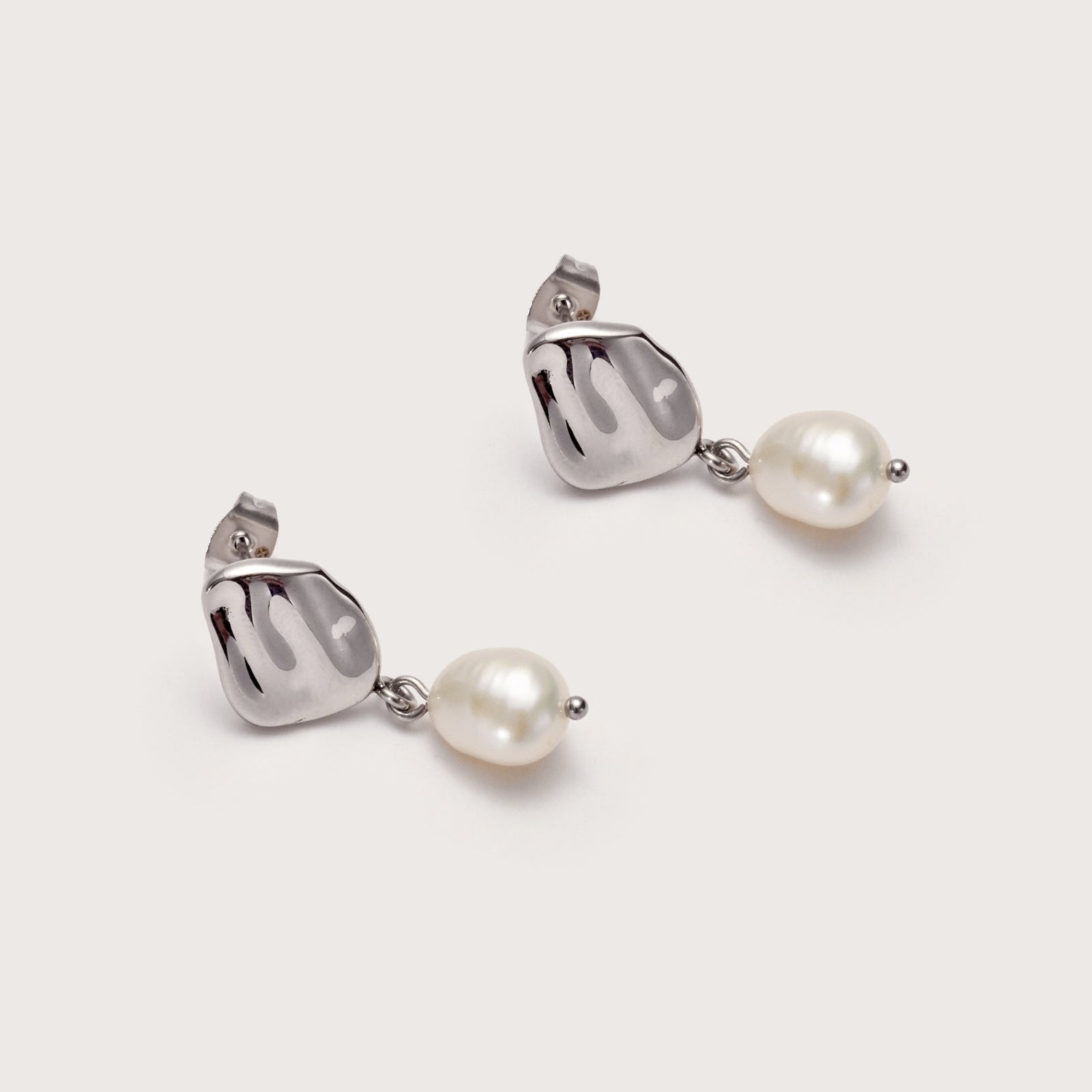 Silver Balearic Pearl Studs on ear
