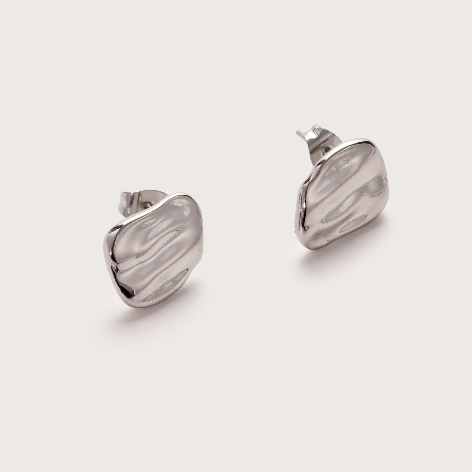 Gold Balearic Pearl Studs on ear