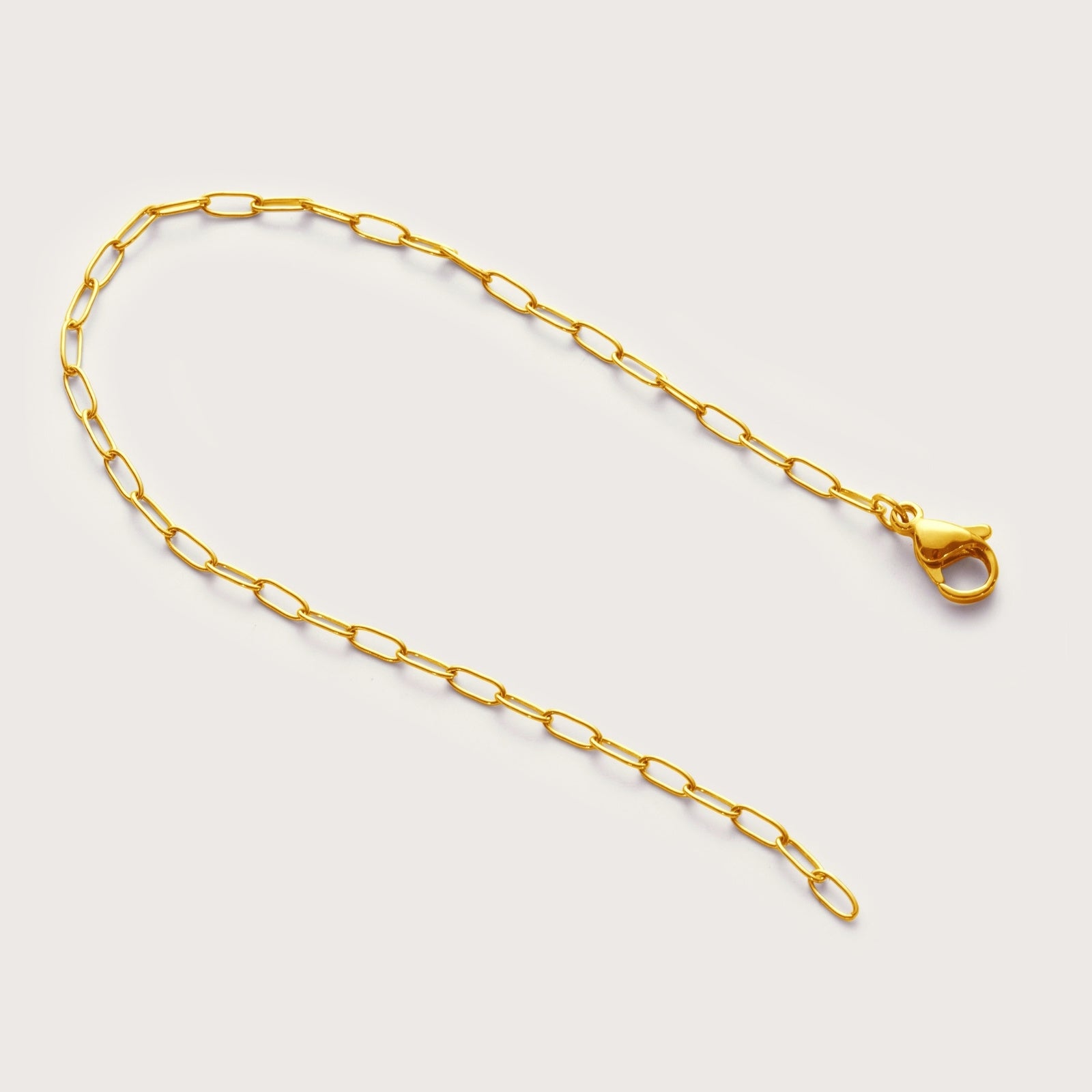 Gold Mini Paperclip Bracelet on wrist