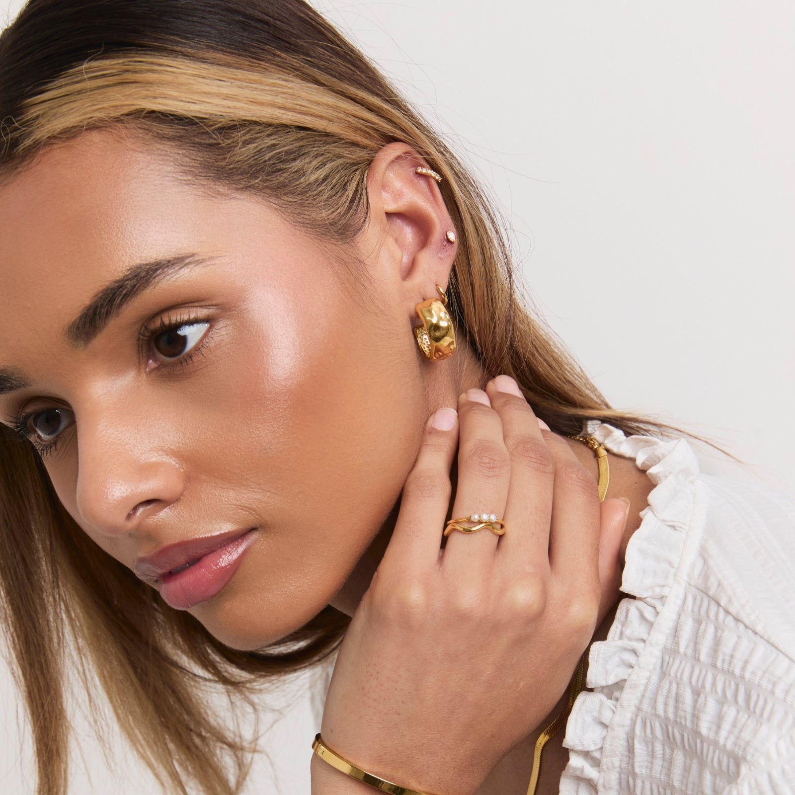 Gold Balaeric Hoops detail showing sculptural texture