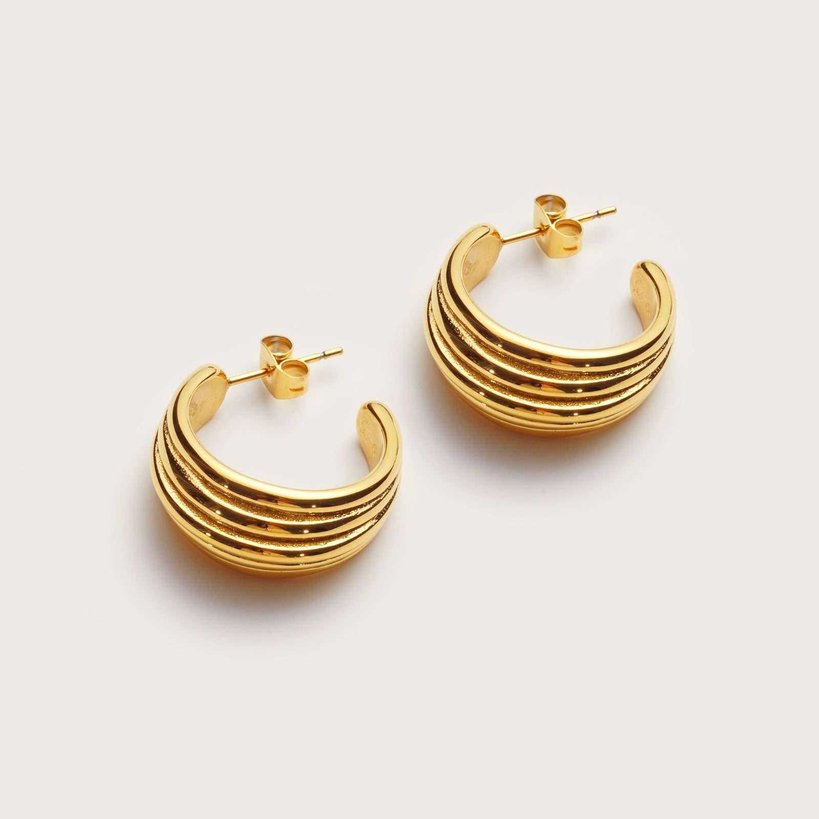 Gold Dune Hoops detail showing rippled sand-inspired texture