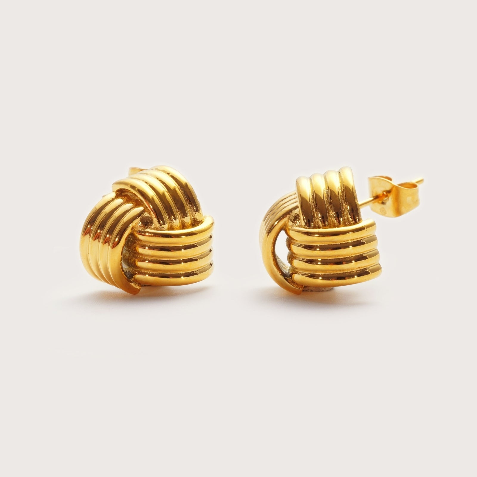 Gold Signature Knot Studs – sculptural knot waterproof gold earrings