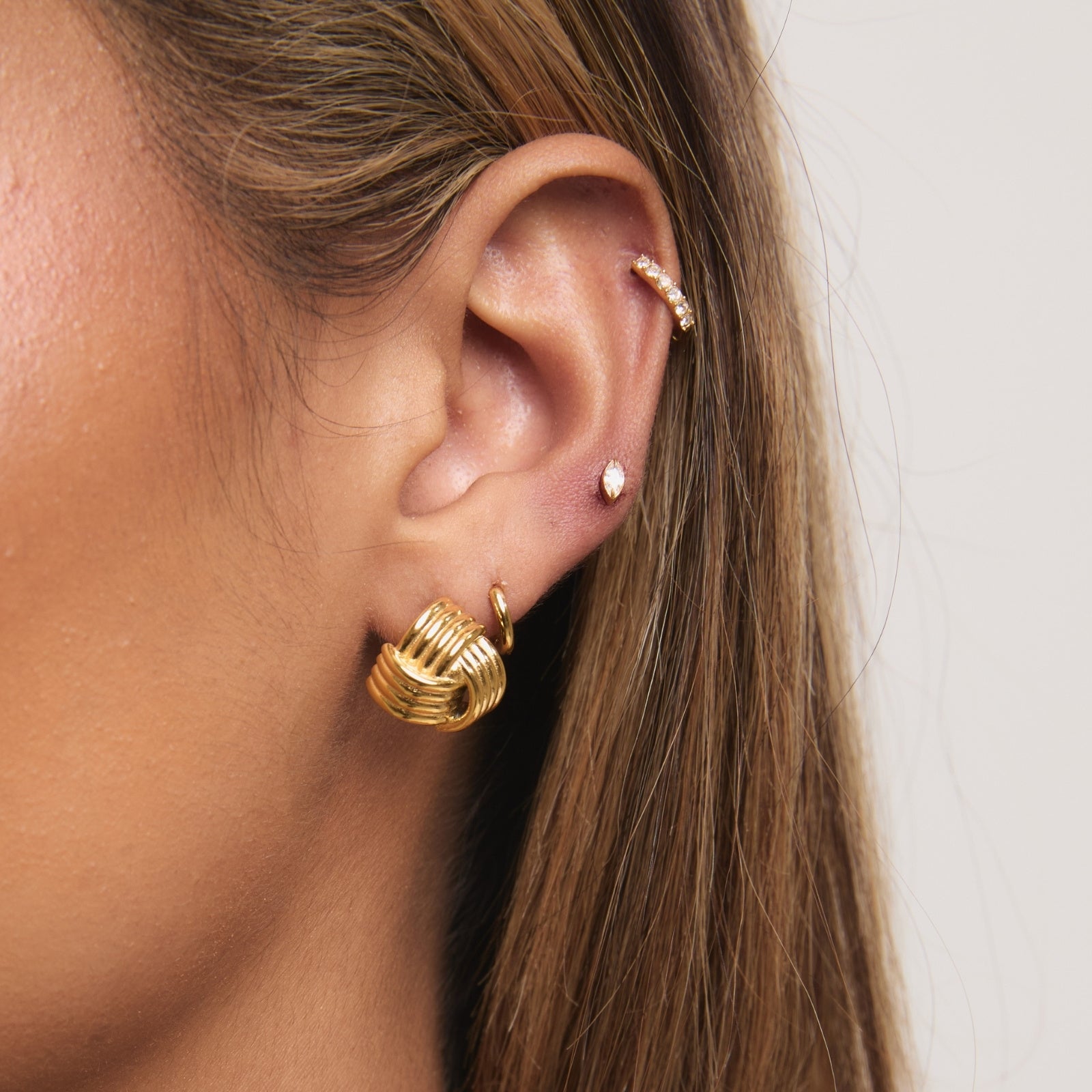 Gold Signature Knot Studs – styling view