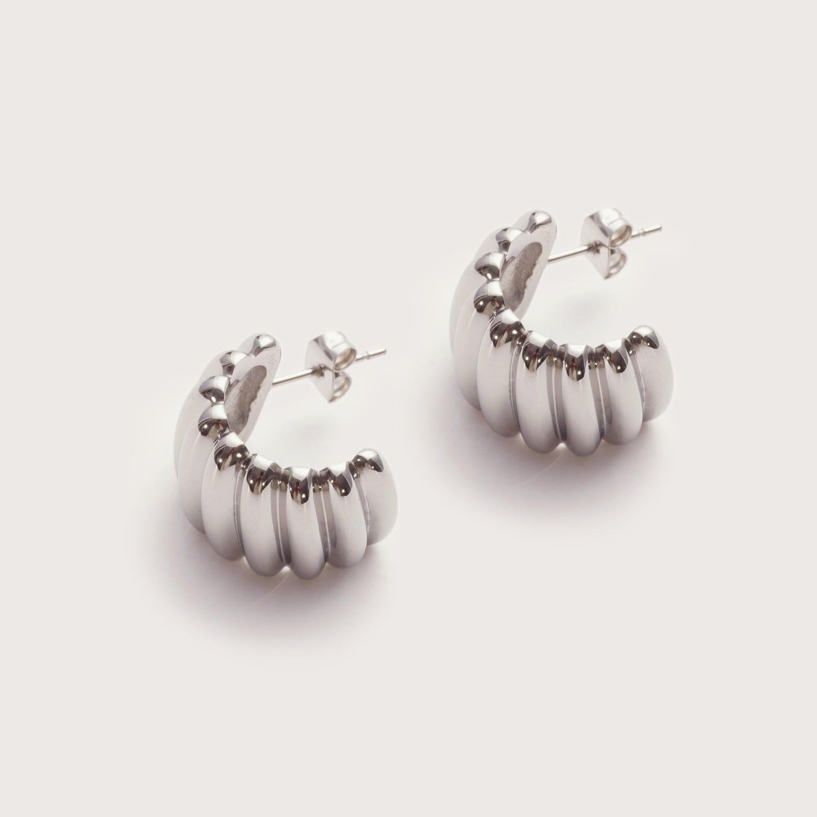 Silver Cove Statement Studs detail showing horizontal ridged texture