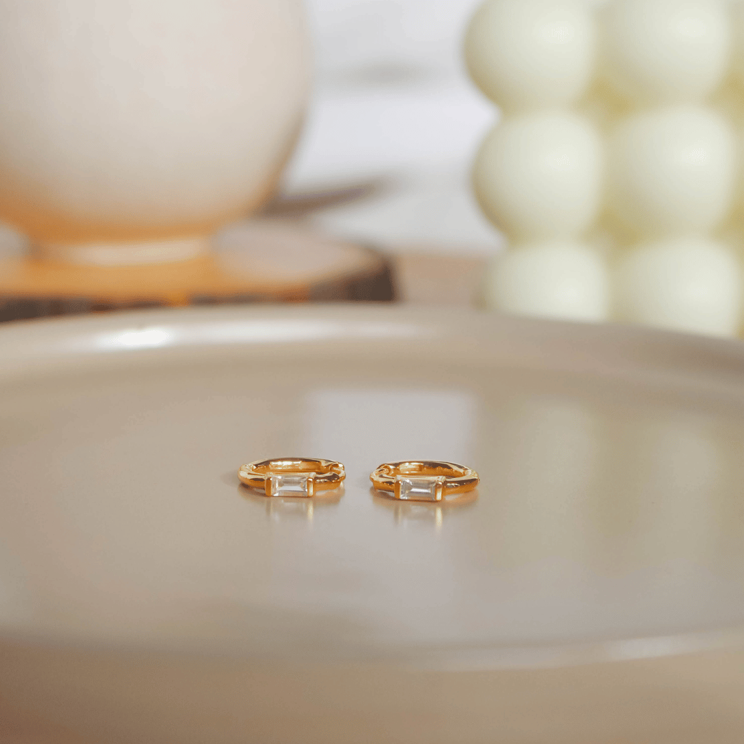 Gold White Topaz Baguette Huggie Earrings