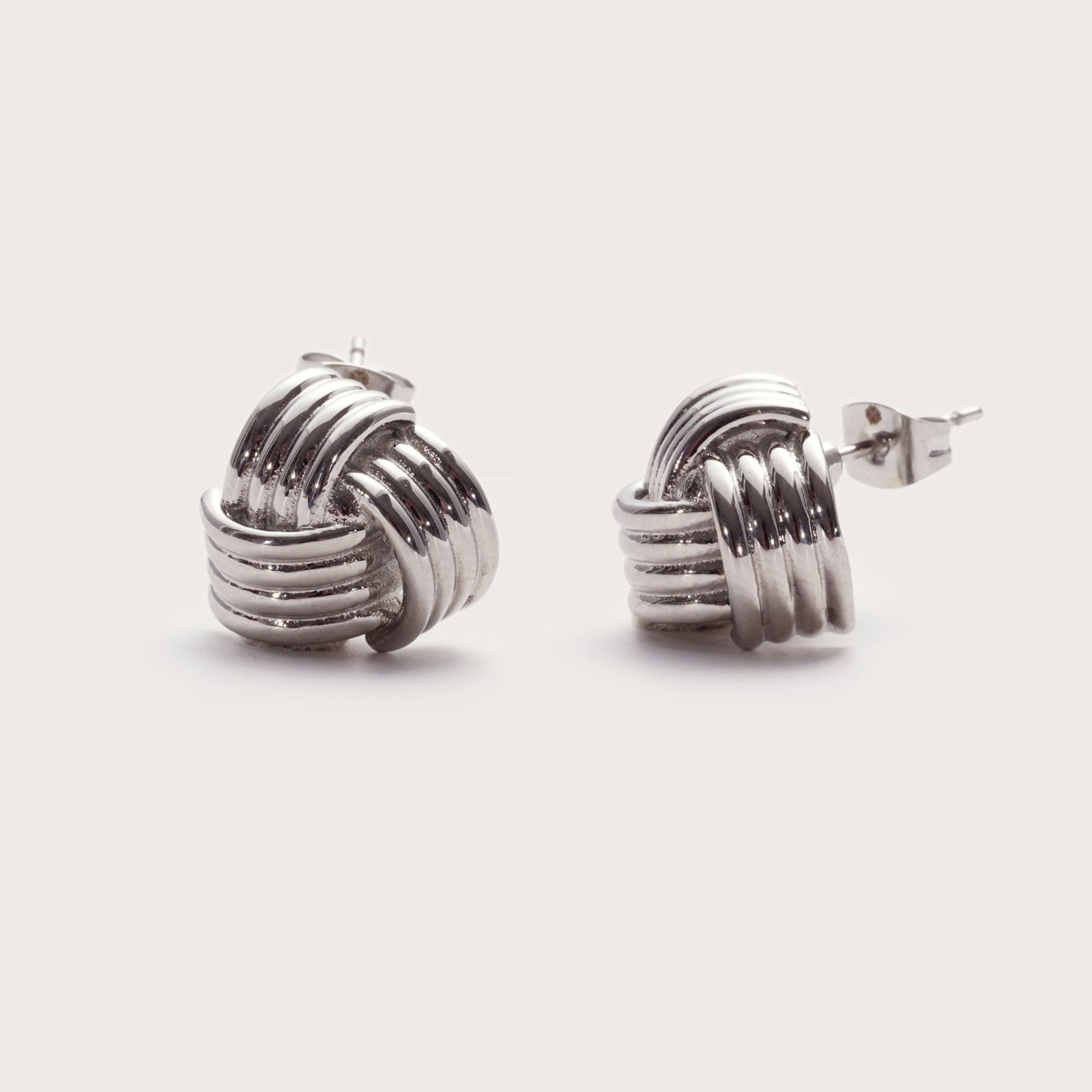 Silver Signature Knot Studs – sculptural knot waterproof silver earrings