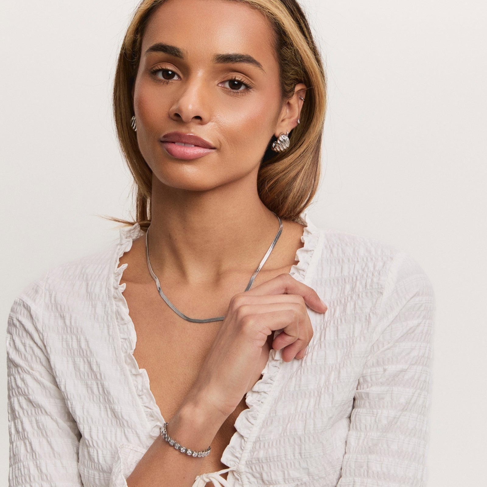 Silver Solstice Statement Studs – styling view
