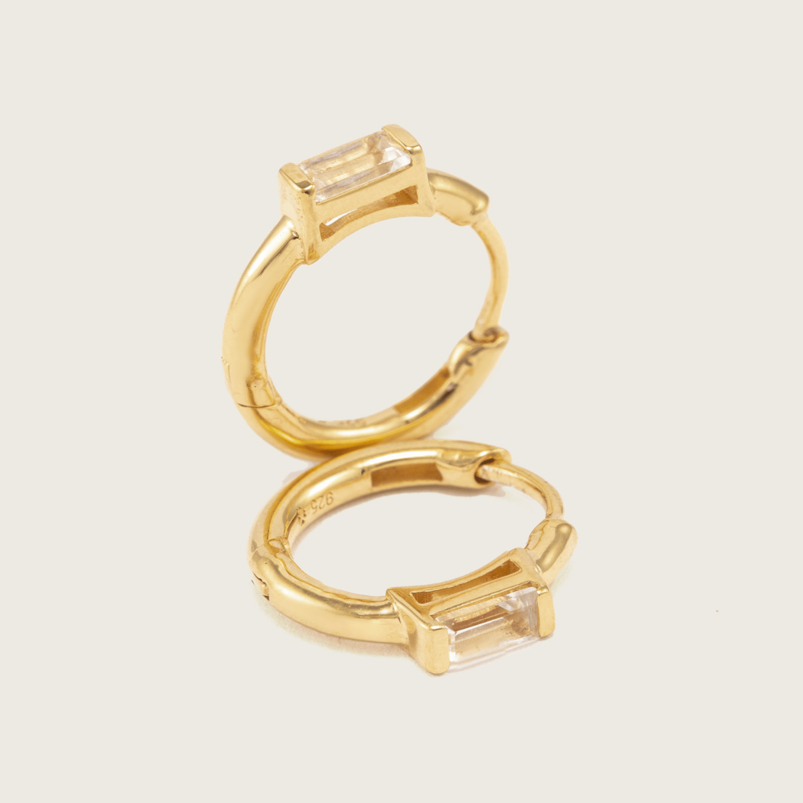 Gold White Topaz Baguette Huggie Earrings
