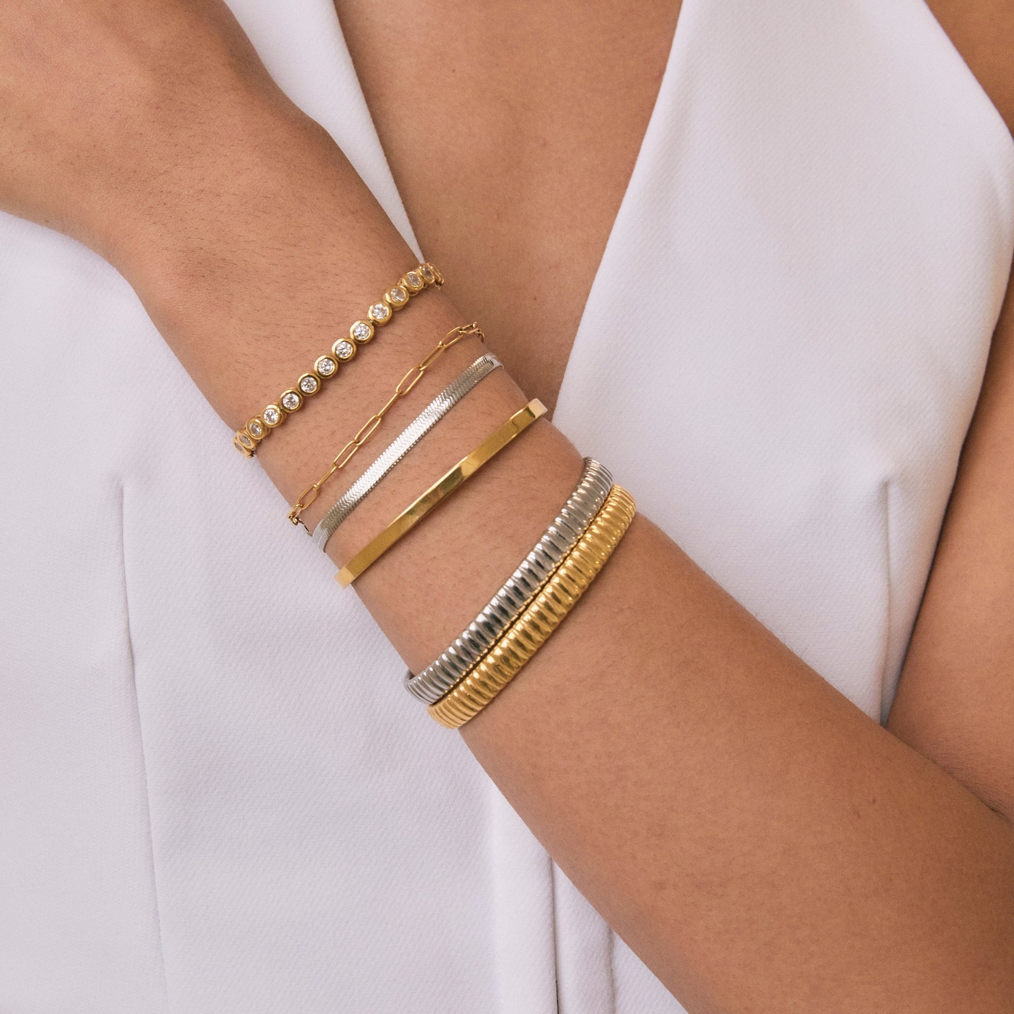 Gold Mini Paperclip Bracelet on model