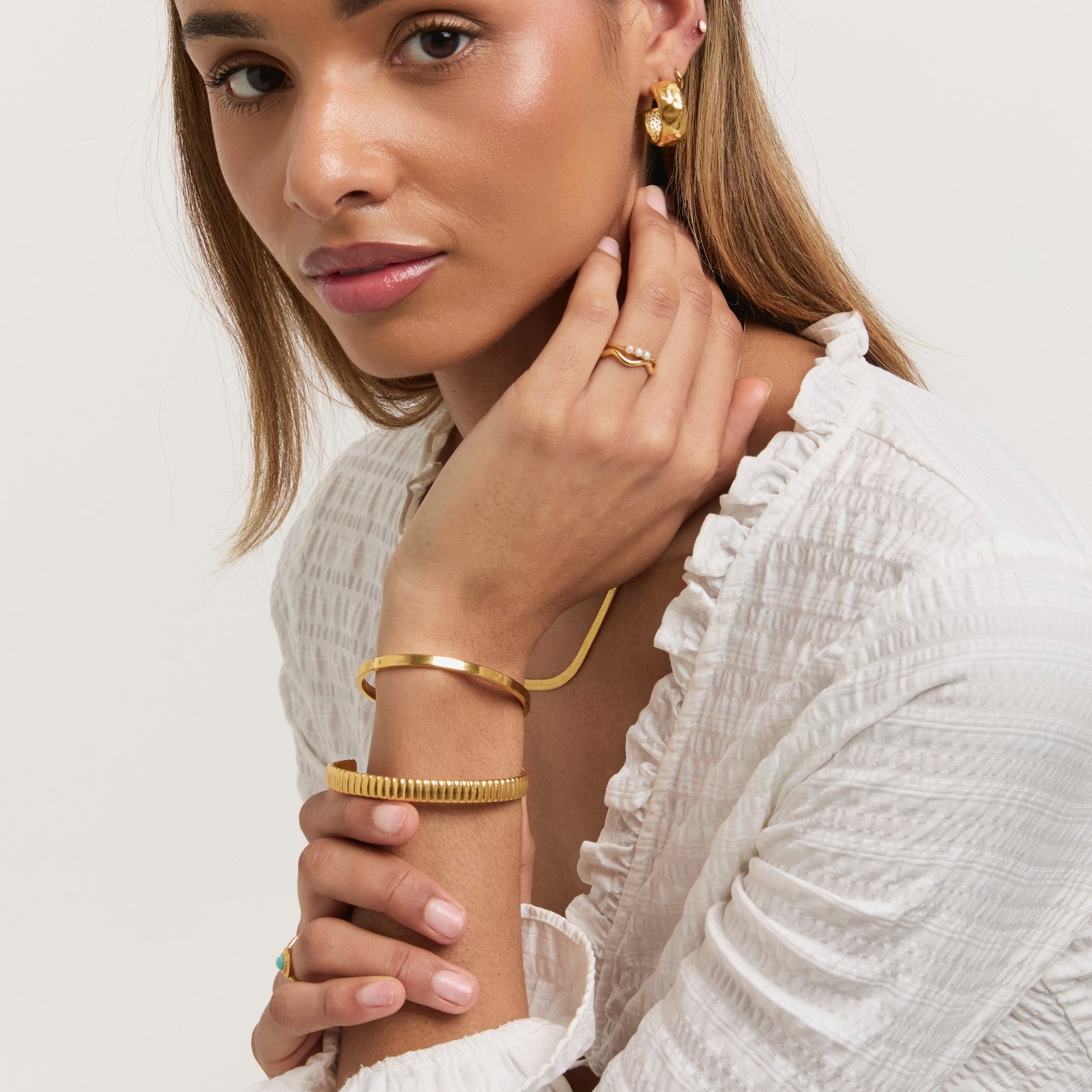 Gold Ridged Bangle on model