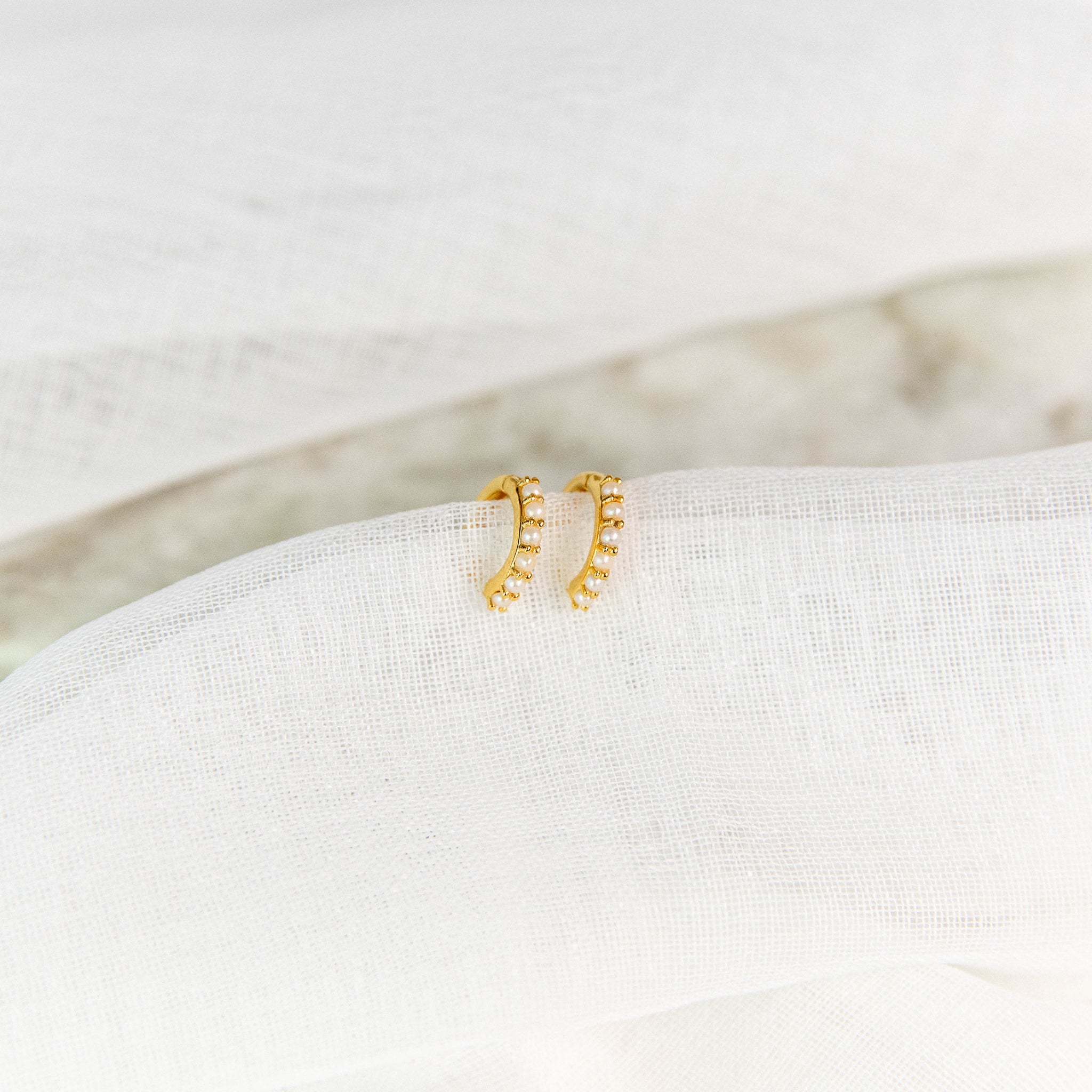 Gold Pearl Huggie Earrings