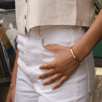 Gold Ultimate Bangle on model showing fit and size