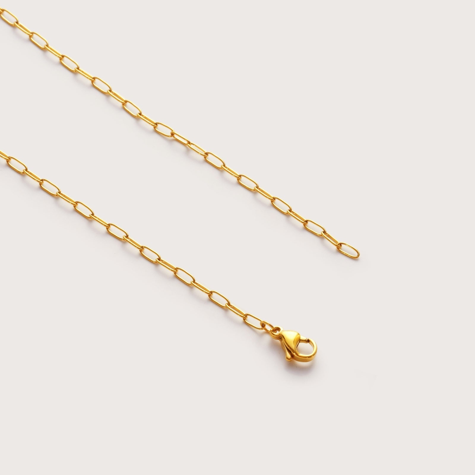 Gold Mini Paperclip Necklace on model