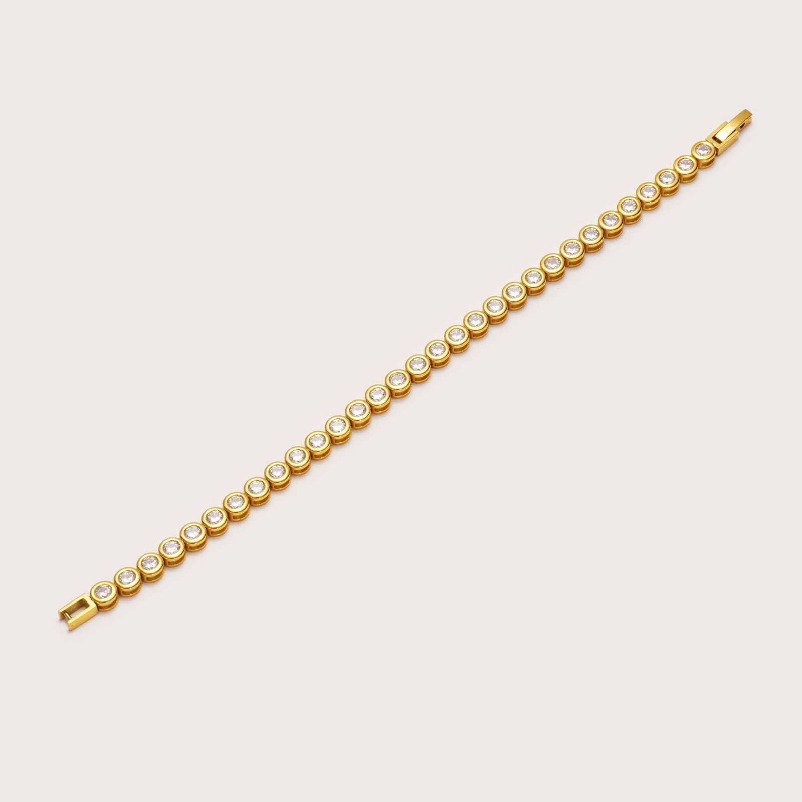 Gold Round Bezel Tennis Bracelet on wrist