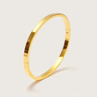 Gold Ultimate Bangle close-up showing rounded edge detail