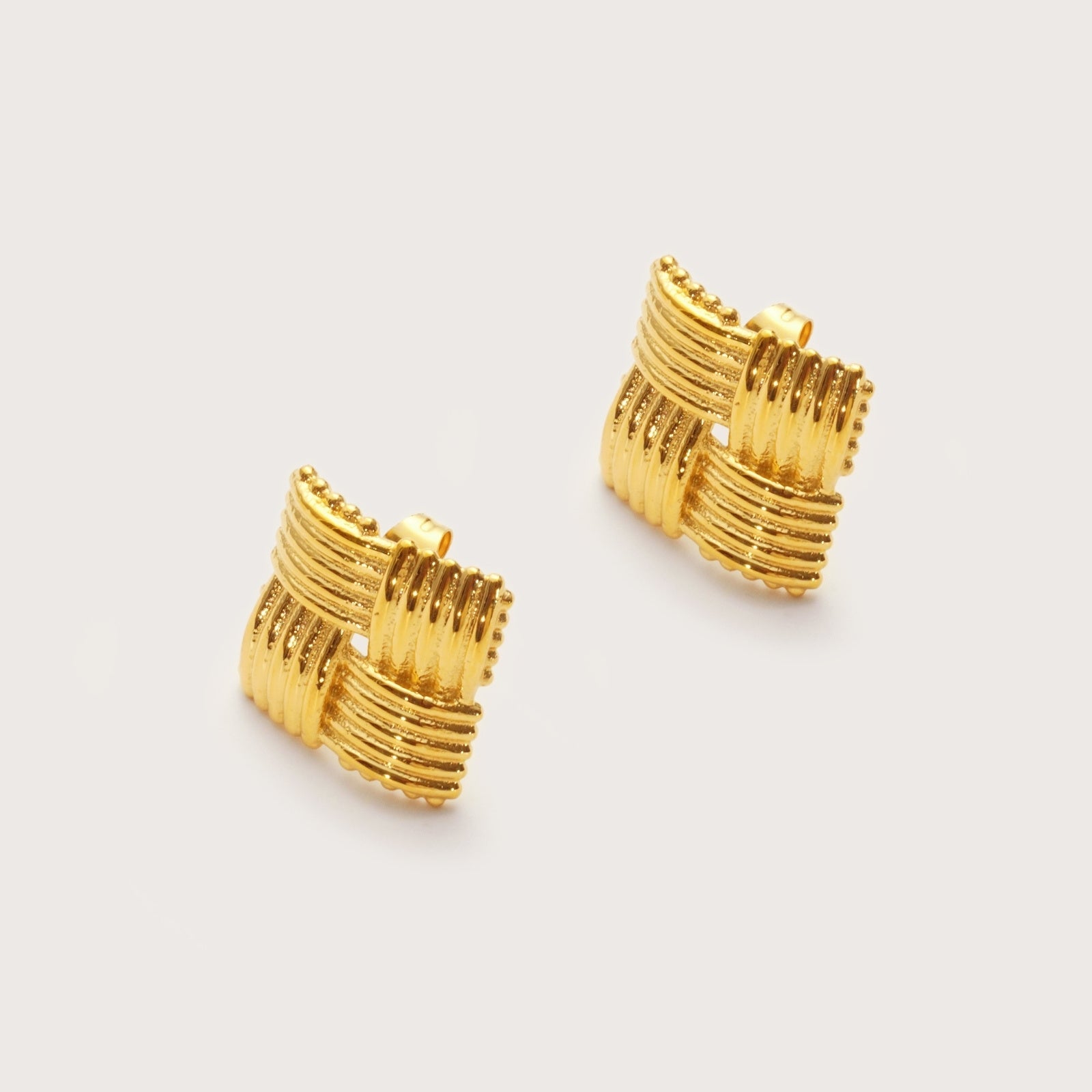 Gold Square Woven Statement Studs detail showing basket-weave texture