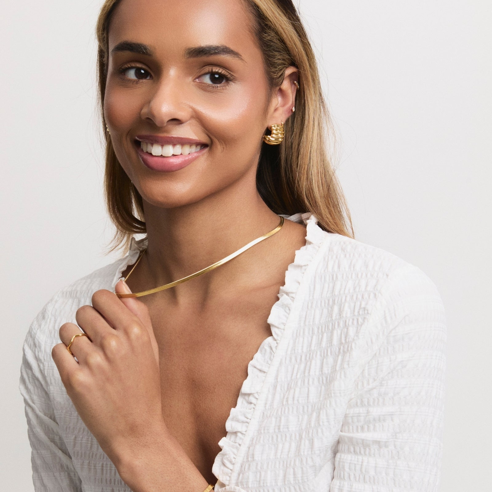 Gold Cove Statement Studs – styling view