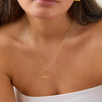 Gold T-Bar Pendant Necklace styled on model