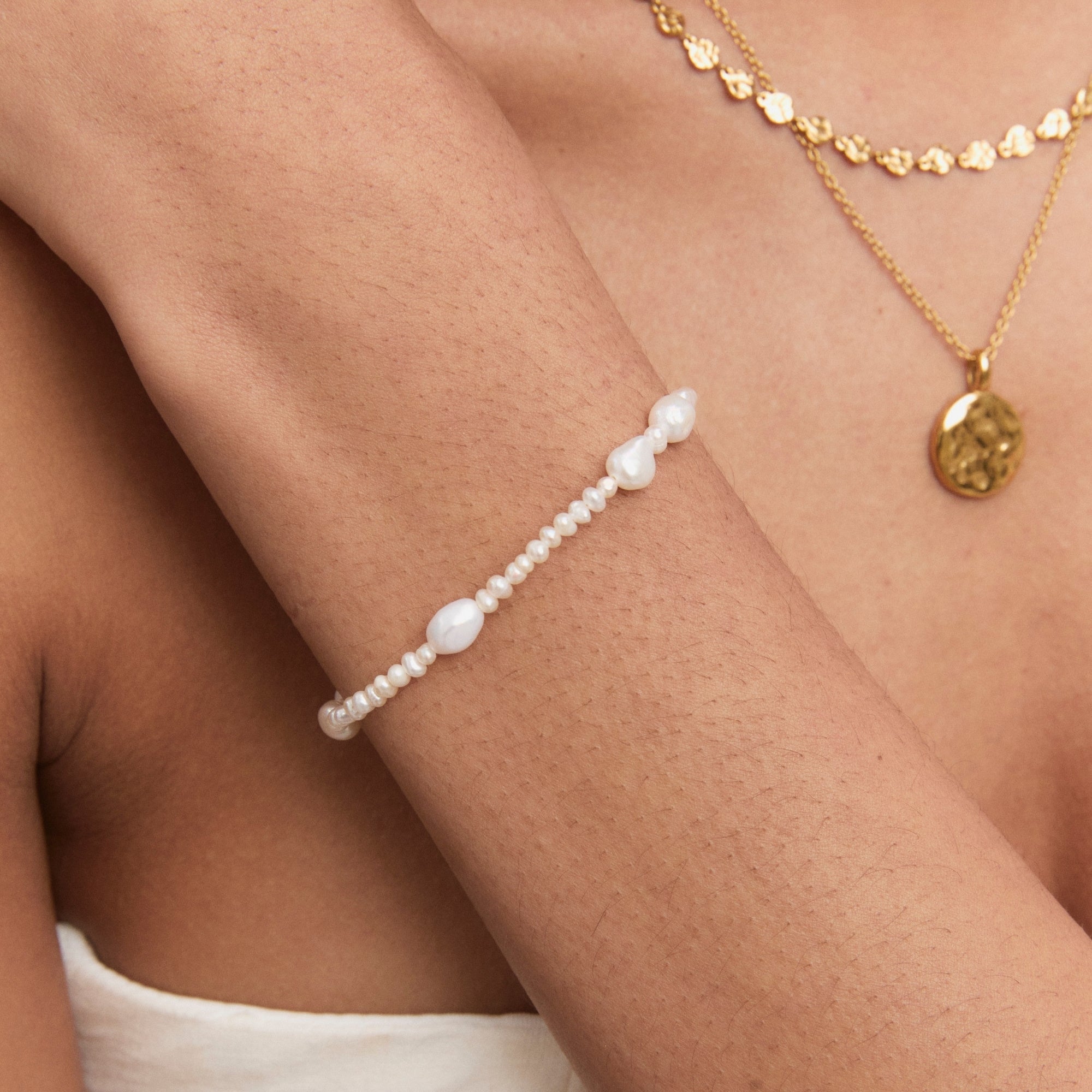 Gold Pearl Bracelet on model