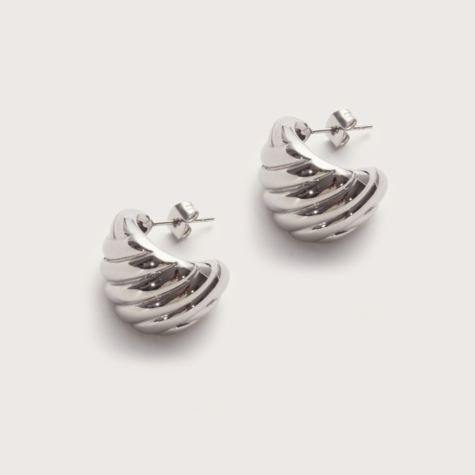 Silver Solstice Statement Studs detail showing woven sun-inspired texture