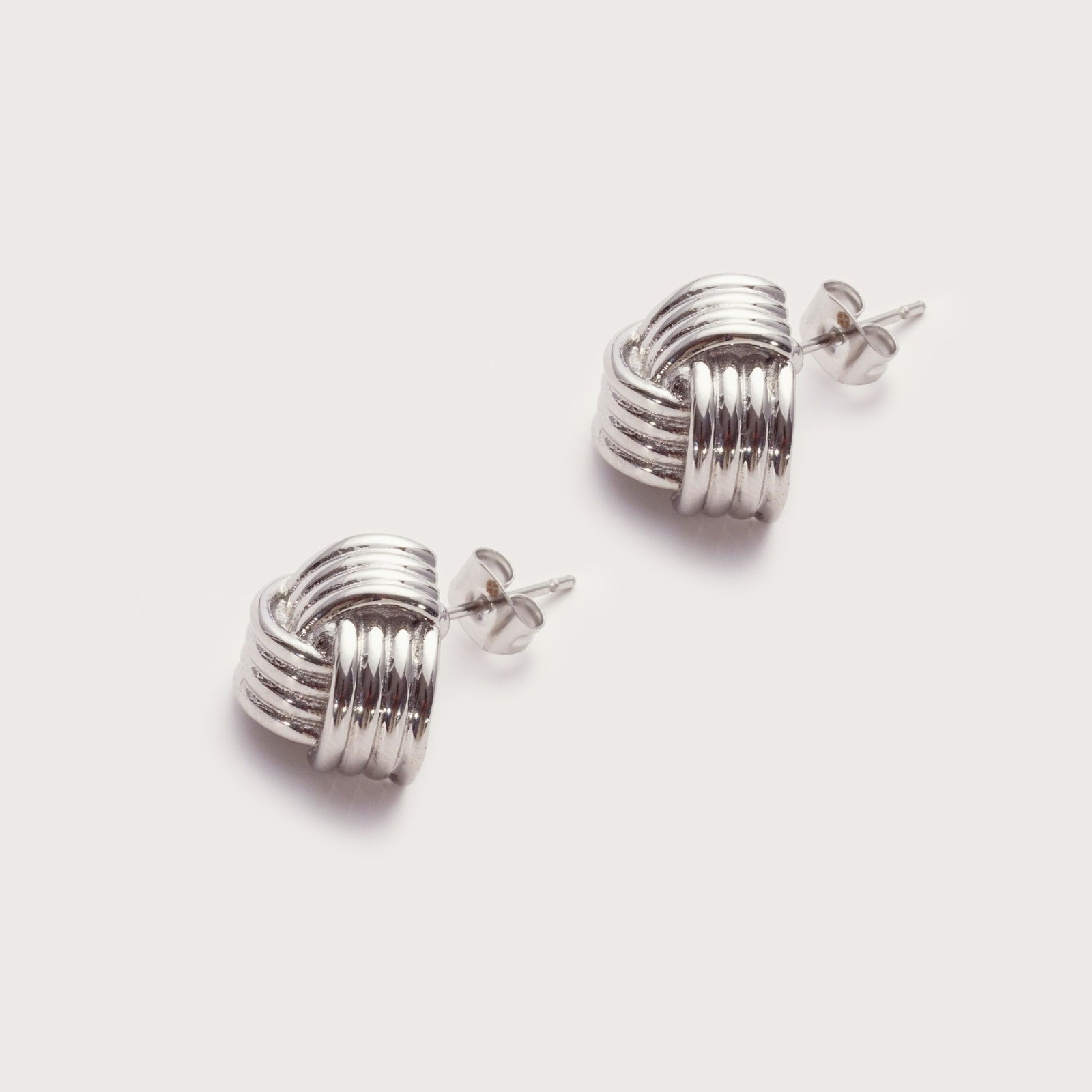 Silver Signature Knot Studs detail showing polished knot design