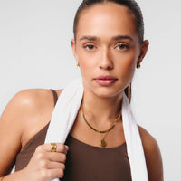 Gold Snake Chain Necklace with Paperclip Necklace and Dome Huggies styling