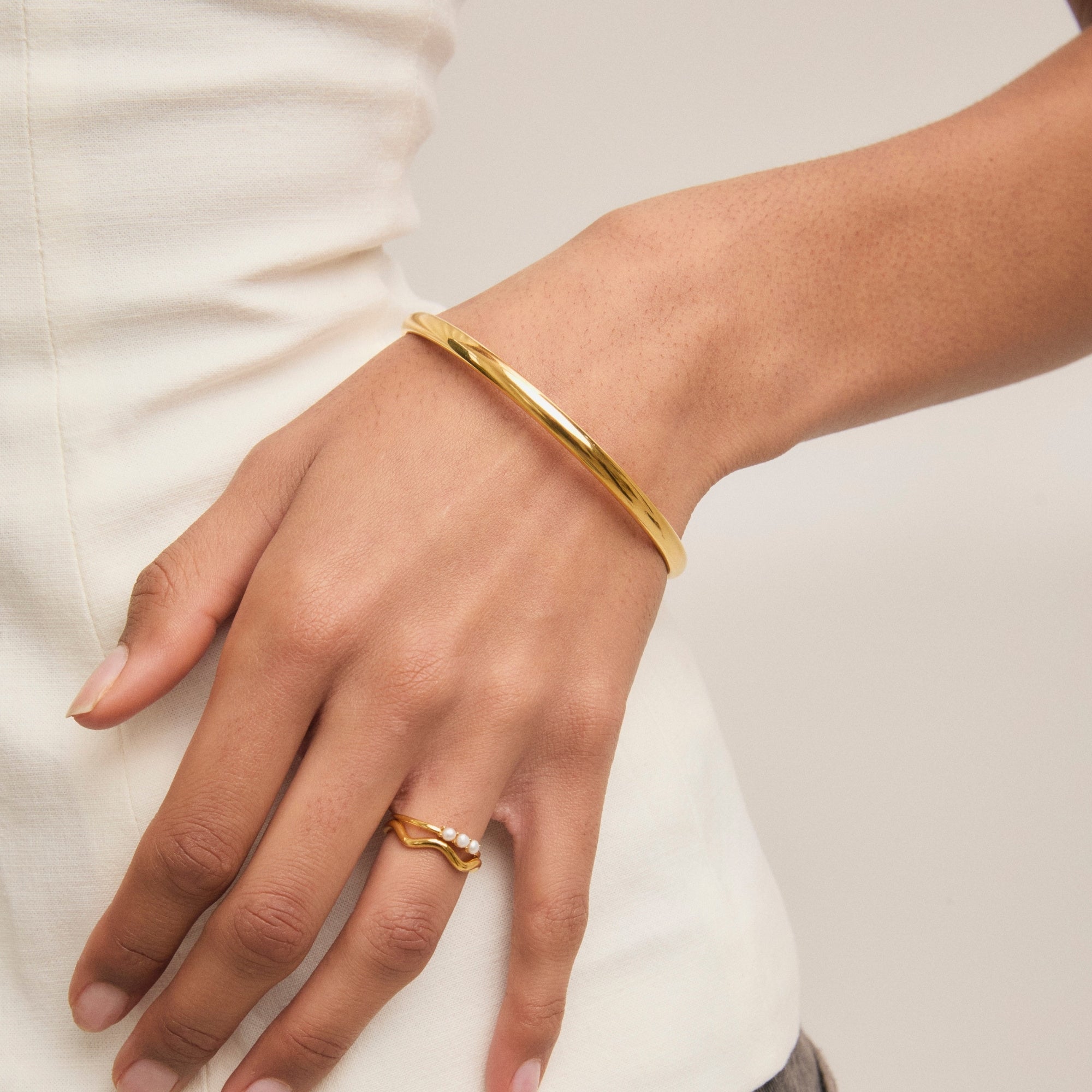 Gold Statement Bangle on model