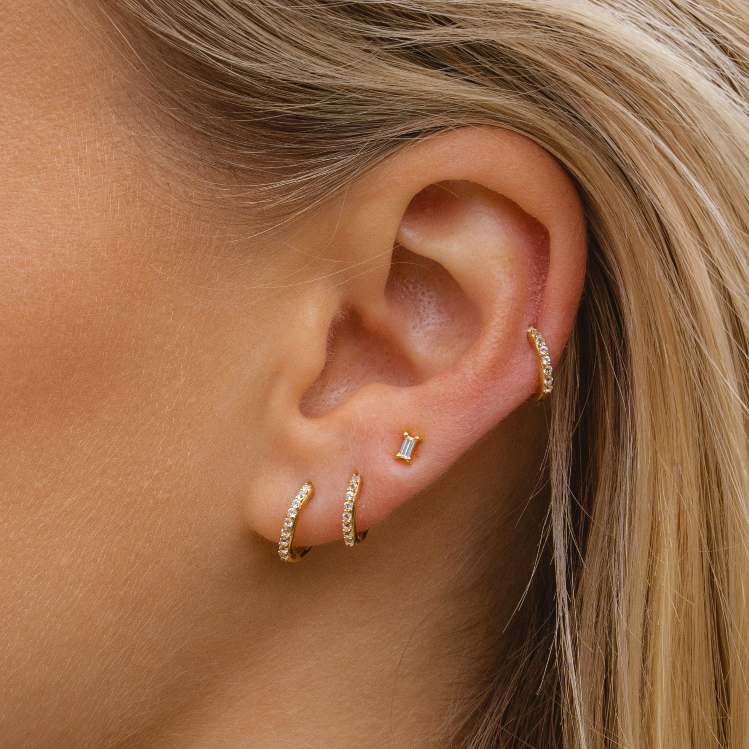 Gold Baguette White Topaz Stud Earrings