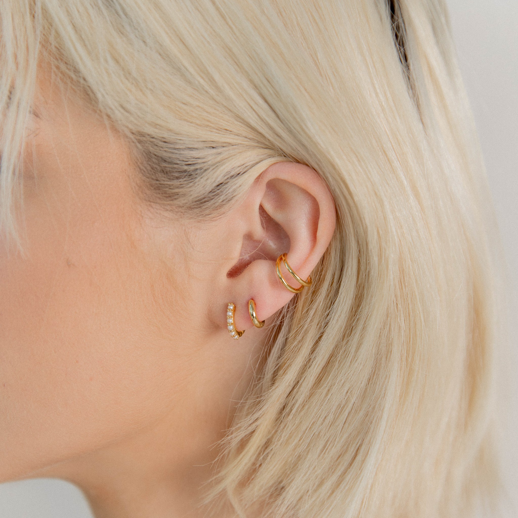 Gold Pearl Huggie Earrings
