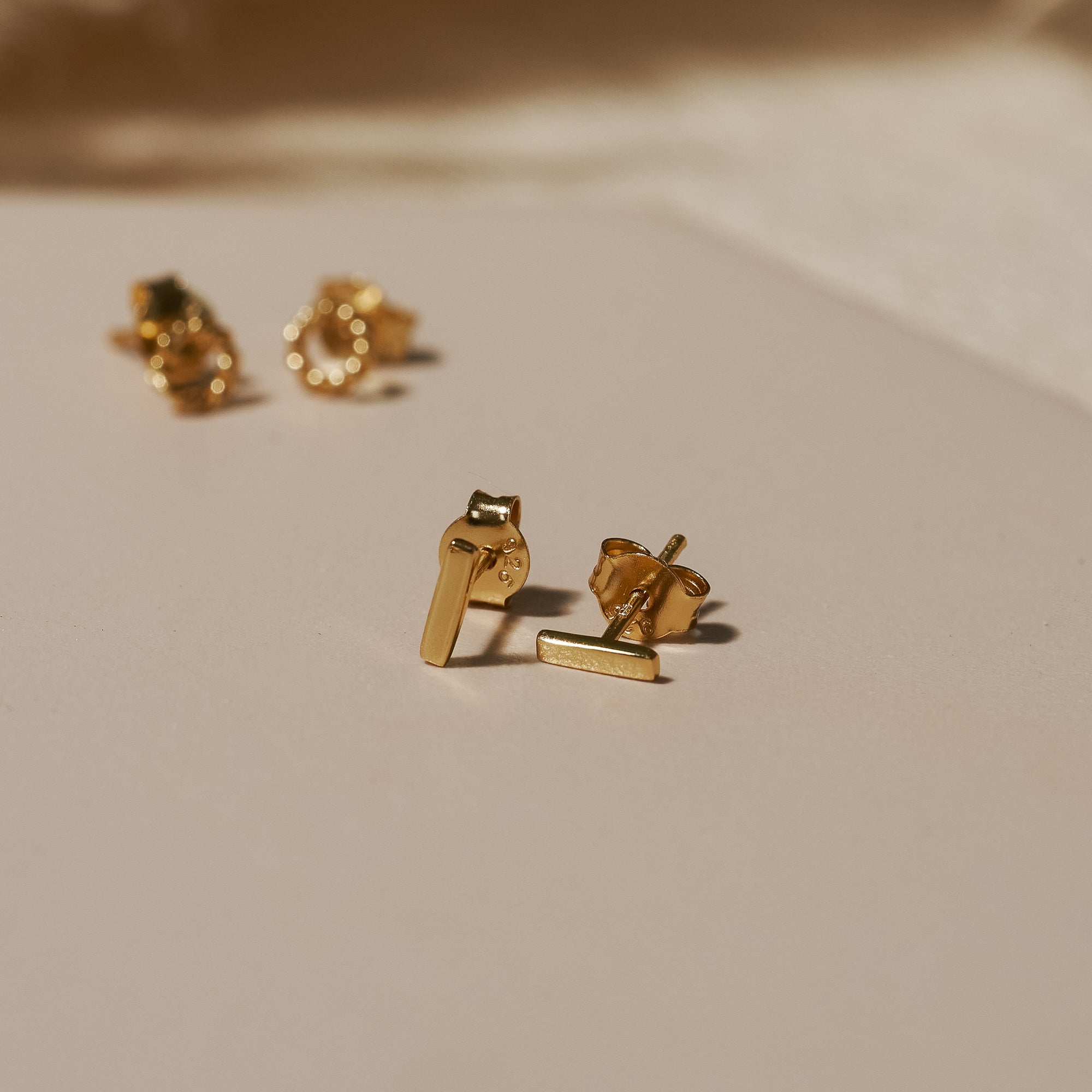 Linear gold store earrings